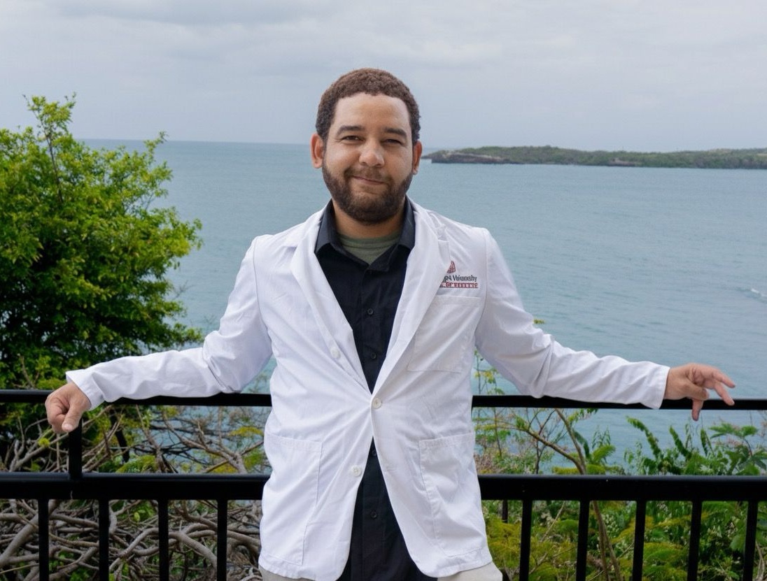 Frank Ureña in a white coat, portrait